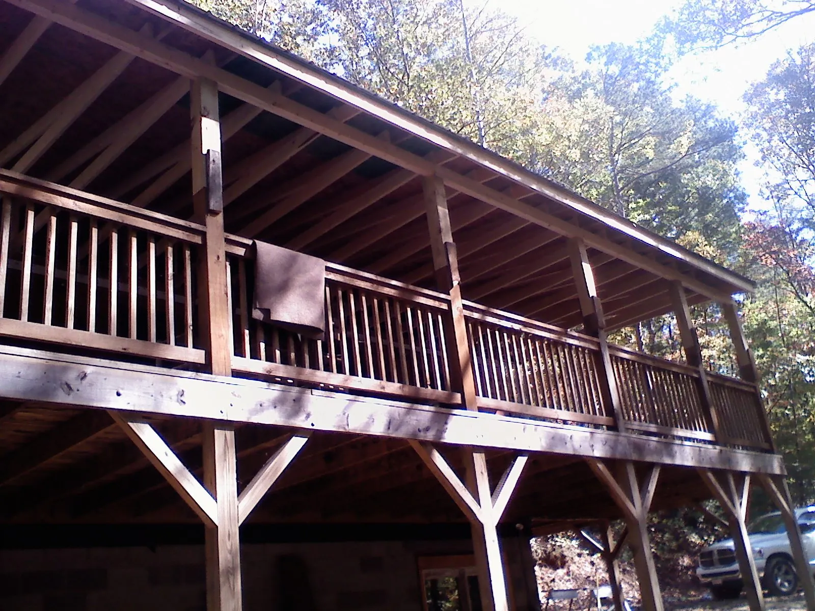 Timber framing under a new elevated porch and deck — Roof Leak Repair in Fairmont by Roofing Brothers